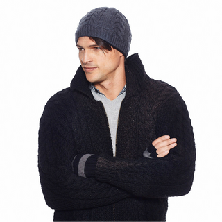A man in a black, Cable Jacket w/ Brass Zipper and beanie.