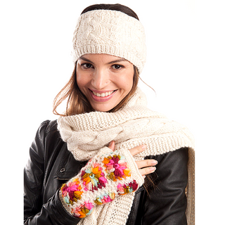A woman wearing Multi Color Flower Crochet Handwarmers and a matching scarf.