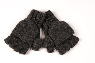 A pair of Fingerless Gloves with Button Flap and Fleece Lining on a white background, an important addition to your winter wardrobe.
