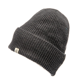 A black Troubadour Rib Fold Beanie hat with a white logo.