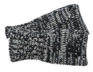 A pair of black and white knitted merino wool handwarmers with a herringbone pattern, handmade in Nepal, folded on a white background.