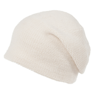 A white knit beanie called The Depp Slouch on a white background, including skincare benefits.