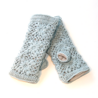 A pair of Flower Crochet Handwarmers adorned with beautiful flowers, perfect for your gardening needs.