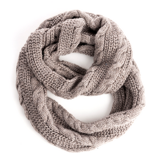 A Trinitas Infinity Scarf in a neutral color, handmade in Nepal, laid out on a white background.