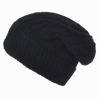 A black knitted Cobain Slouch hat with a cable pattern on a white background, handmade in Nepal and featuring a fleece lining.