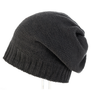 A Big Rib Band Slouch m knit hat on a stand.