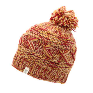 A red and yellow Reverse cross pom pom hat.