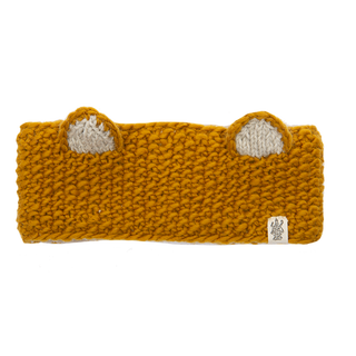 A cozy sherpa knitted fox ears headband in mustard.