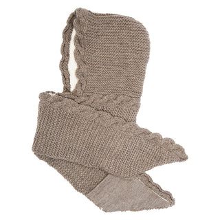 A 2 Pocket Scarf Hood crafted from merino wool with a textured pattern and scalloped edges is showcased on a white background, with one side overlapping the other. The knit appears thick and cozy, perfectly suited for cold weather.