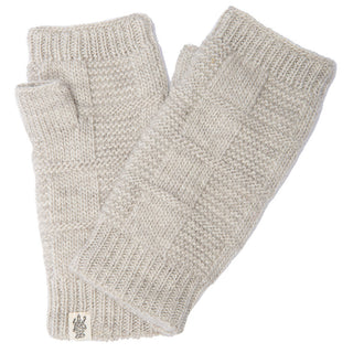 A pair of checkered handwarmers from Nepal on a white background.