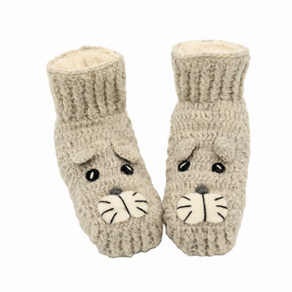 A pair of Shmil The Cat slippers on a white background.