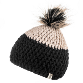 A Dimensions Crochet Beanie with a color gradient transitioning from black to beige, topped with a fluffy faux fur pom-pom, displayed against a white background.