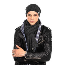 A young man in a black leather jacket and a Dekalb Slouch scarf.