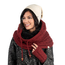 A woman wearing a cold-weather burgundy Dekalb Slouch scarf and beanie.