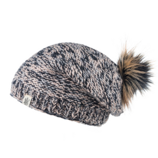A handmade Bedford Slouch beanie hat with a faux fur pom pom.