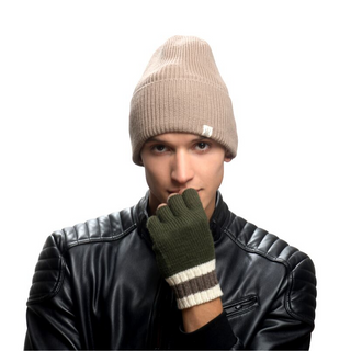 A man wearing a Troubadour Rib Fold Beanie and a black jacket.