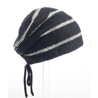 A black and white striped, handmade Stripe Pouch Slouch Hat on a mannequin.