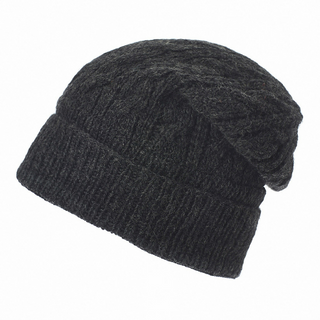 A black knitted Cobain Slouch hat with a fleece lining, isolated on a white background.