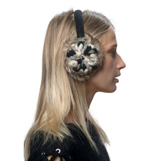 A woman wearing Kaleidoscope Earmuffs with adjustable straps.