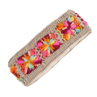Sentence with product name: A Flower Crochet Headband- MULTI's with multi-color flowers on it.