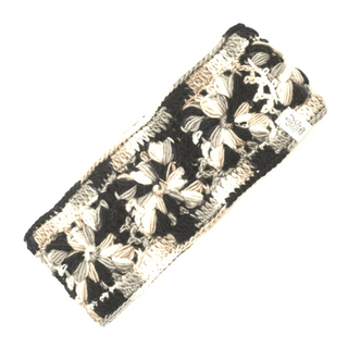 A black and white Flower Crochet Headband- MULTI's perfect for your winter ensemble.