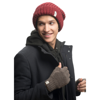 A young man wearing a beanie and Striped and Solid Fingerless Gloves.