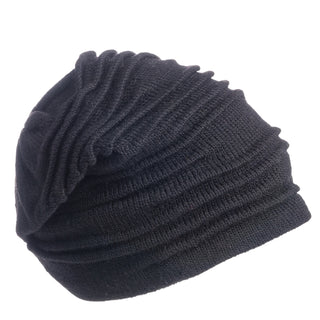A black organic Branch Out Slouch knitted beanie on a white background.