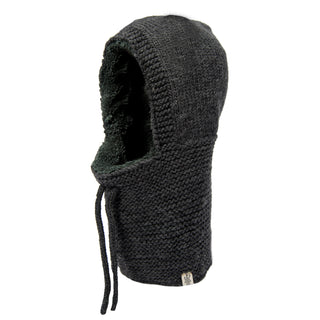 A black handmade knitted Eddy Hood with a hood, crafted from merino wool.