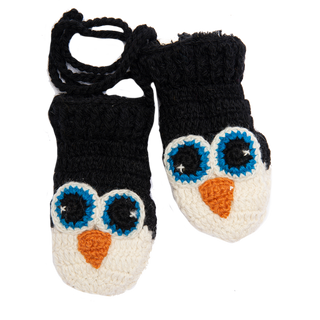 A pair of Crochet Penguin Mittens with blue eyes.