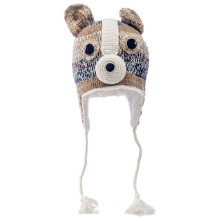 Crochet Chiwawa hat designed to resemble a dog's face with ear flaps and braided ties.