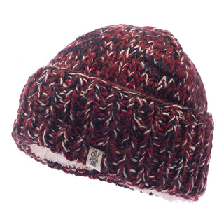 Introducing the Marbled Rib Fold Beanie! This handmade, knitted wool beanie from Nepal showcases a stunning blend of red, black, and white threads. It features a thick weave pattern and a convenient fold-up brim adorned with a small white tag. The hat is lined with soft white fleece for added warmth and comfort.