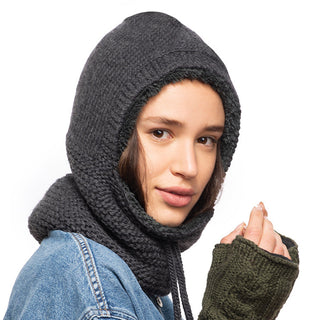 Sentence with product name: A woman wearing a handmade Eddy Hood and gloves.