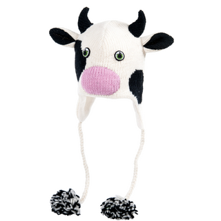 A hand-knit wool Cow Hat with ear flaps and pom-pom details, isolated on a white background.