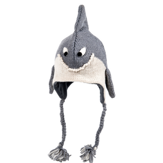 A hand-knit, wool Shark Hat with tassels and a smiling face design, isolated on a white background.