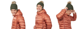 A person in an orange puffer jacket and green knit hat with a pom-pom is shown in three poses: looking down, smiling at the camera, and adjusting the hat. The background is white.