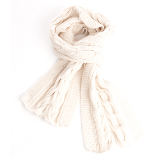 A cream-colored Lucky Knit Scarf with a horseshoe rib knit design, isolated on a white background.