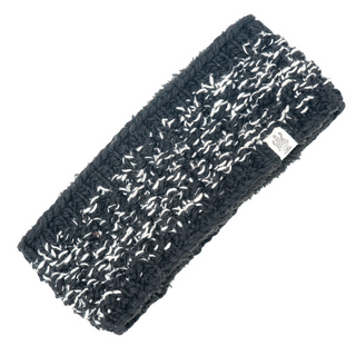 A black and white knitted Aurora Headband made of merino wool.