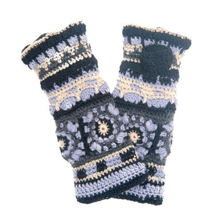 A pair of Dreams Crochet Handwarmers, handmade in Nepal, with a pattern in shades of black, gray, and white displayed against a white background.