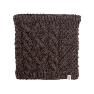 A brown Merino wool cable knit Margins Neckwarmer made of yarn with a visible tag on the bottom right.