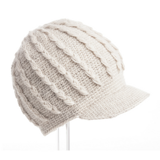 A white Knit Jockey Cap with a braid knit and cable knit pattern displayed on a white background.