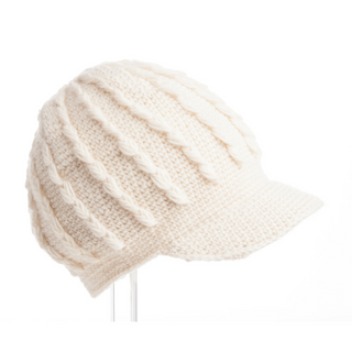 Handmade Nepal knitted Knit Jockey Cap with a braid knit cap brim on a white background.