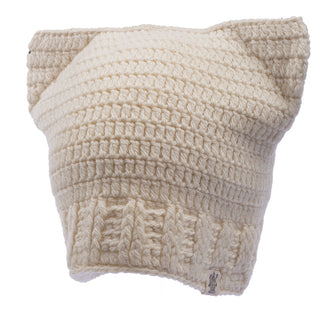 A handmade in Nepal, cream-colored, wool, crochet-knitted ear hat isolated on a white background.