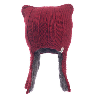 A red, handmade Illyrian helmet earflap hat with a grey fur lining.