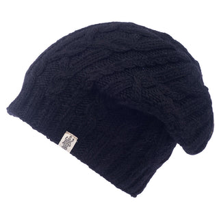 A black Alexander Cable Slouch knit hat with a white logo.