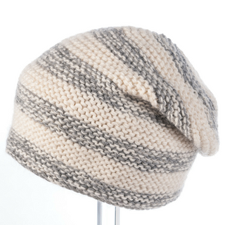 A Soft Stripe Slouch beanie on a mannequin.