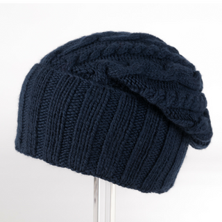 A dark blue wool Folded Slouch displayed on a stand against a white background.