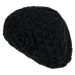 A black, Say It With a Rose Beret made of Merino wool knit isolated on a white background.