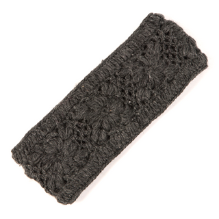 A handmade black Flower Crochet Headband- SOLIDS with a fleece lining on a white background.