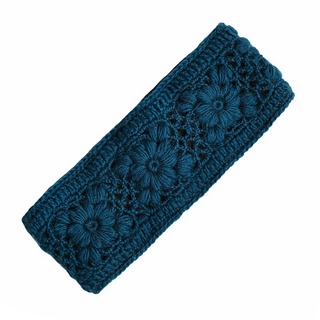 A blue wool Flower Crochet headband crocheted with flowers on it.