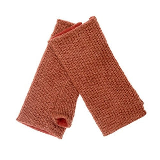 A pair of red, fair trade Solid Hand Warmers with Fleece Lining on a white background.